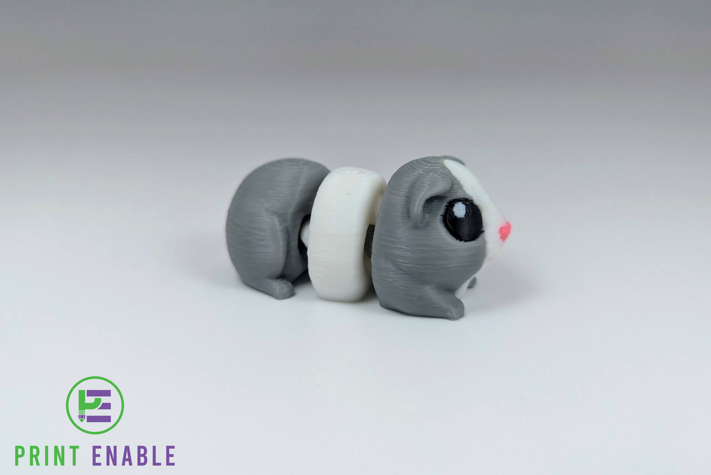Grey Guinea Pig Hatchling articulated 3D printed fidget side view showing articulated segments and body detail