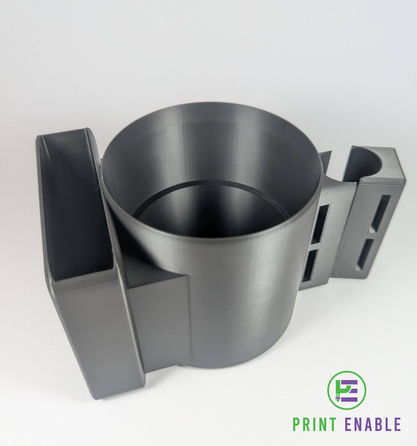 Wheelchair cup holder with integrated phone slot mounted on rail