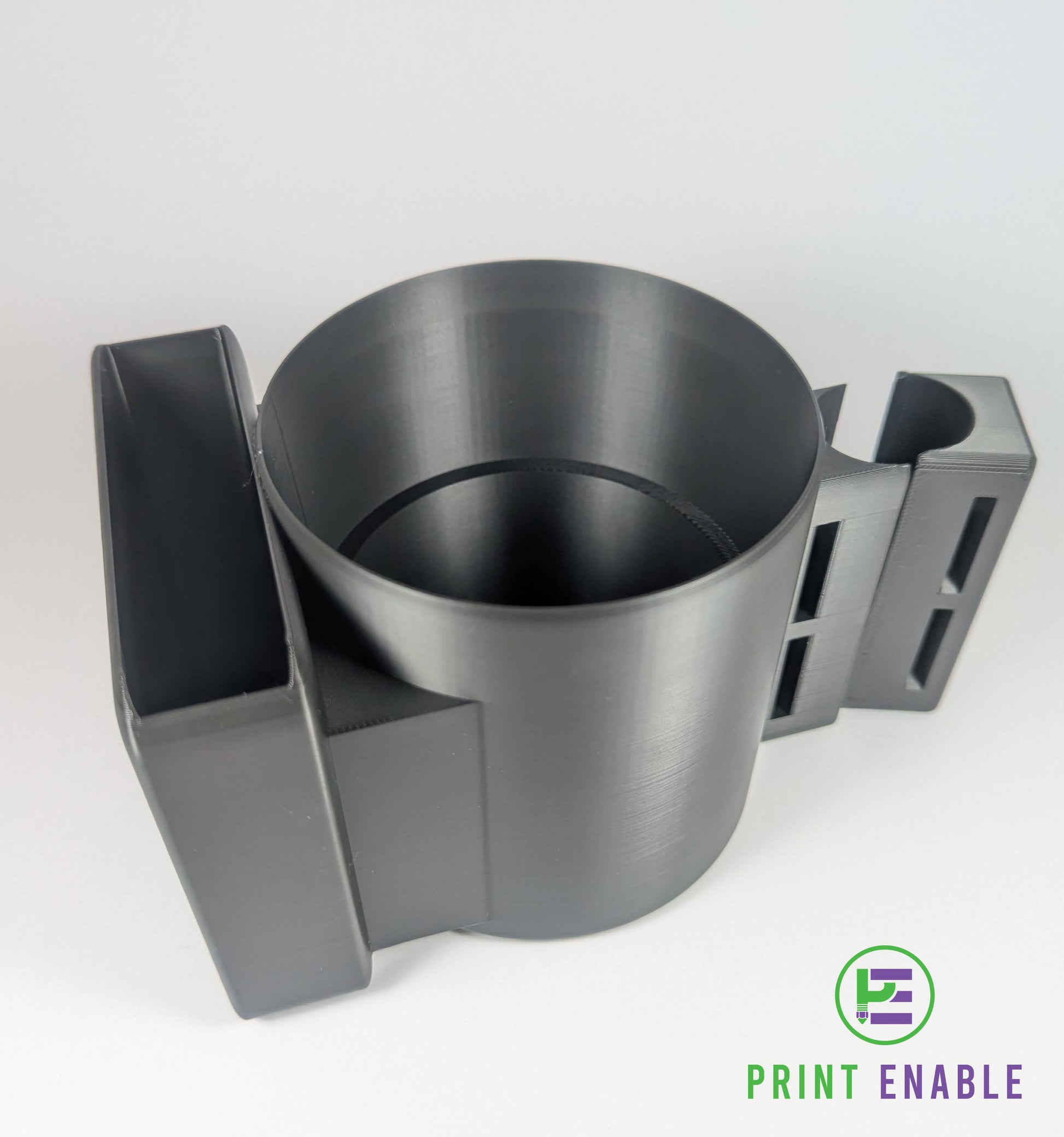 Wheelchair cup holder with integrated phone slot mounted on rail