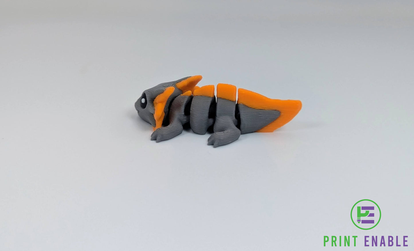 Grey and orange Axolotl Hatchling articulated 3D printed fidget side view