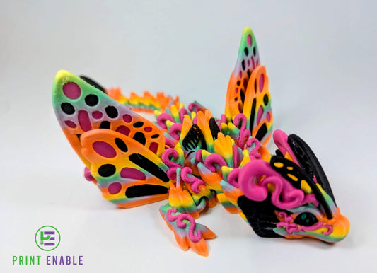 Articulated Baby Butterfly Dragon with colourful butterfly-inspired wings and detailed fantasy styling