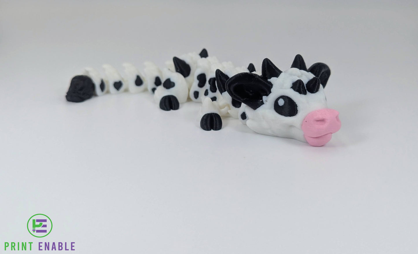 Articulated Baby Cow Dragon 3D printed dragon in black and white colour scheme