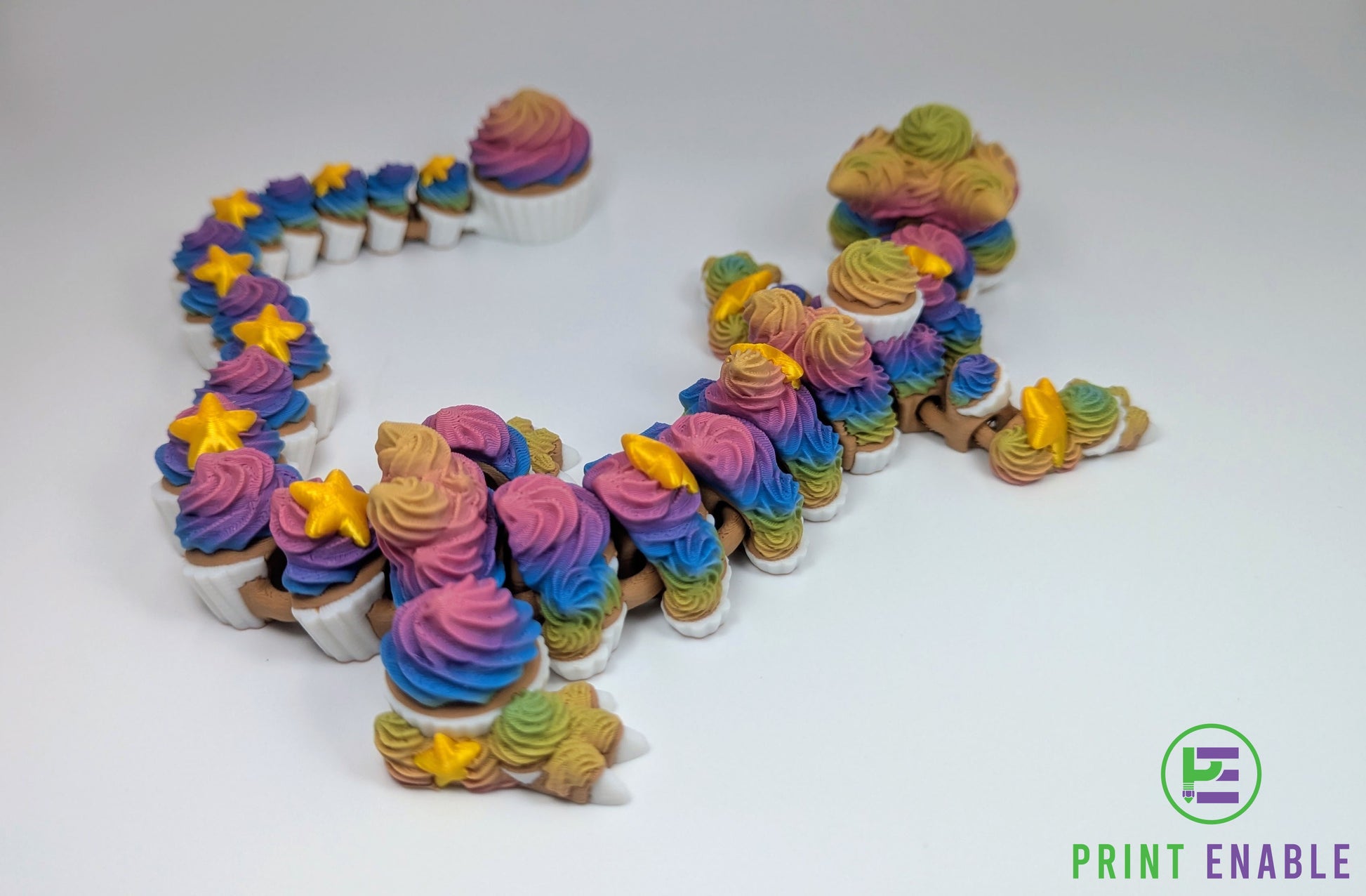 Detailed view of the Cupcake Dragon body showing articulated movement and colourful frosting-inspired scales.