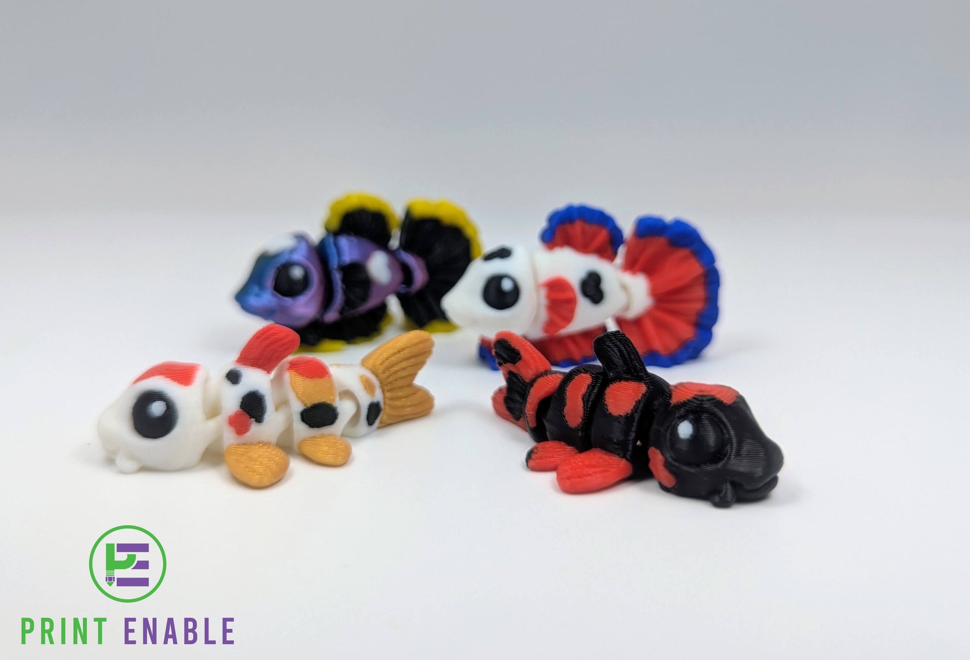 Fish Hatchling collection featuring articulated Koi Fish and Fighting Fish 3D printed fidgets