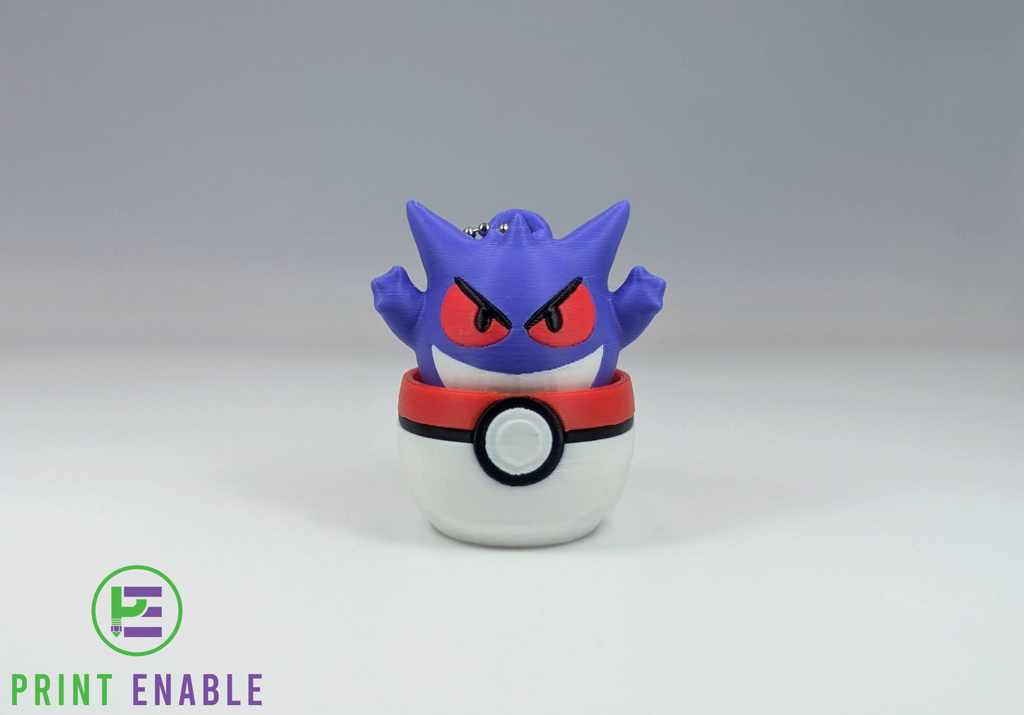 Gengar 3D printed character fidget clicker keychain emerging from a ball with a satisfying mechanical click action.