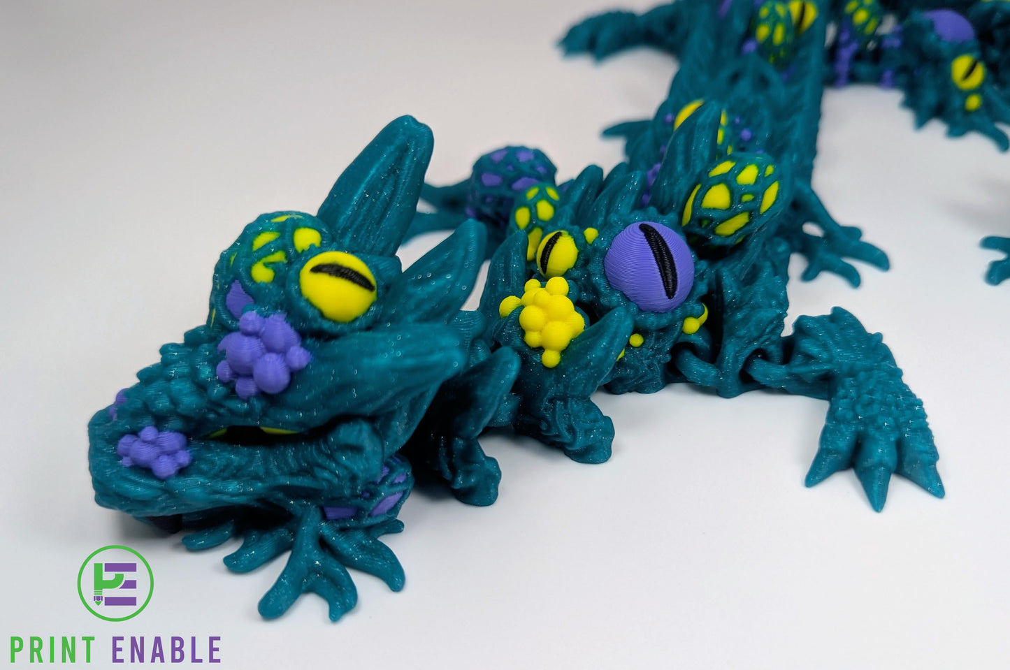 Poseable Infested Dragon collectible featuring intricate creature growths and fantasy styling.