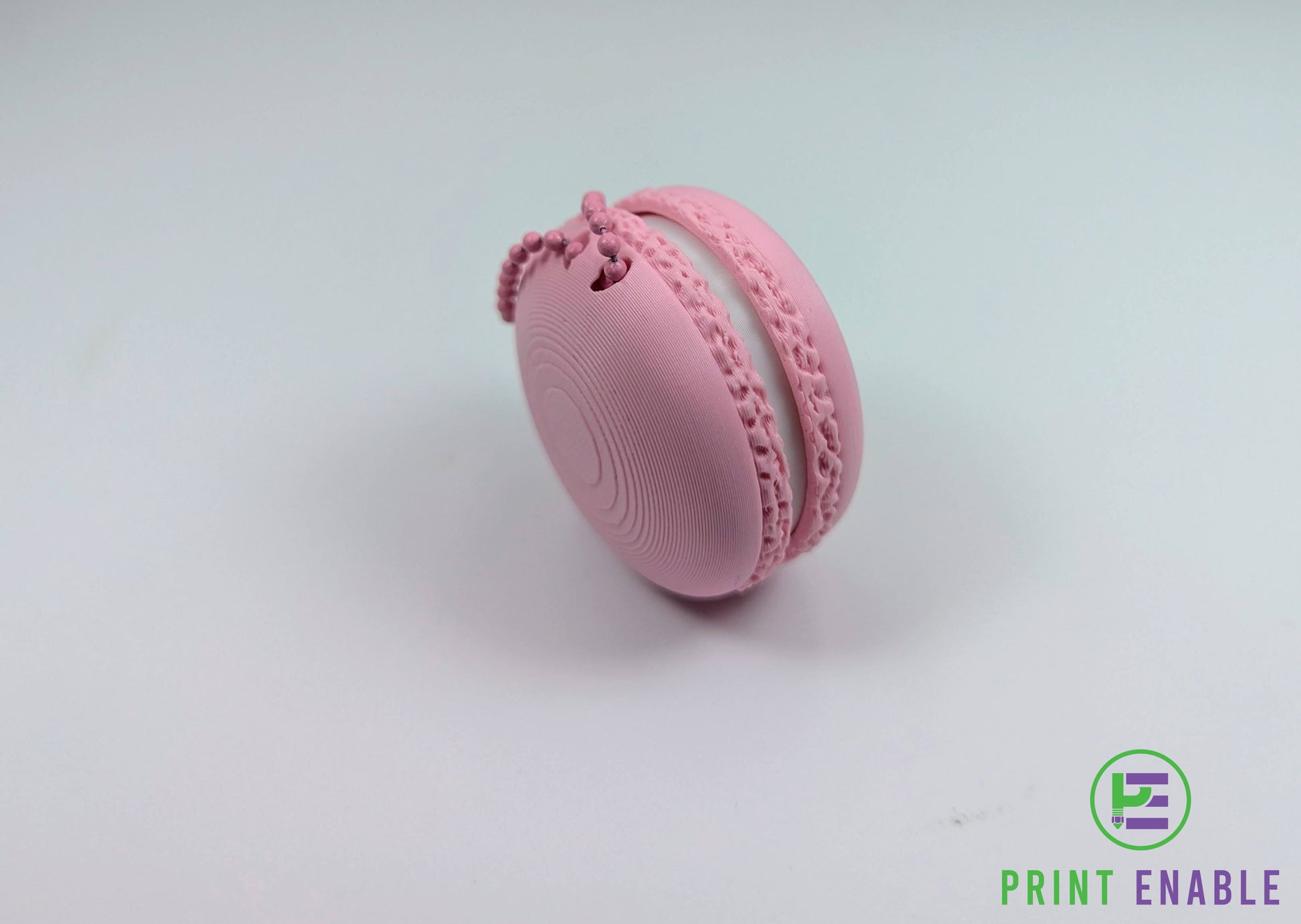 Pink macaron fidget clicker keychain