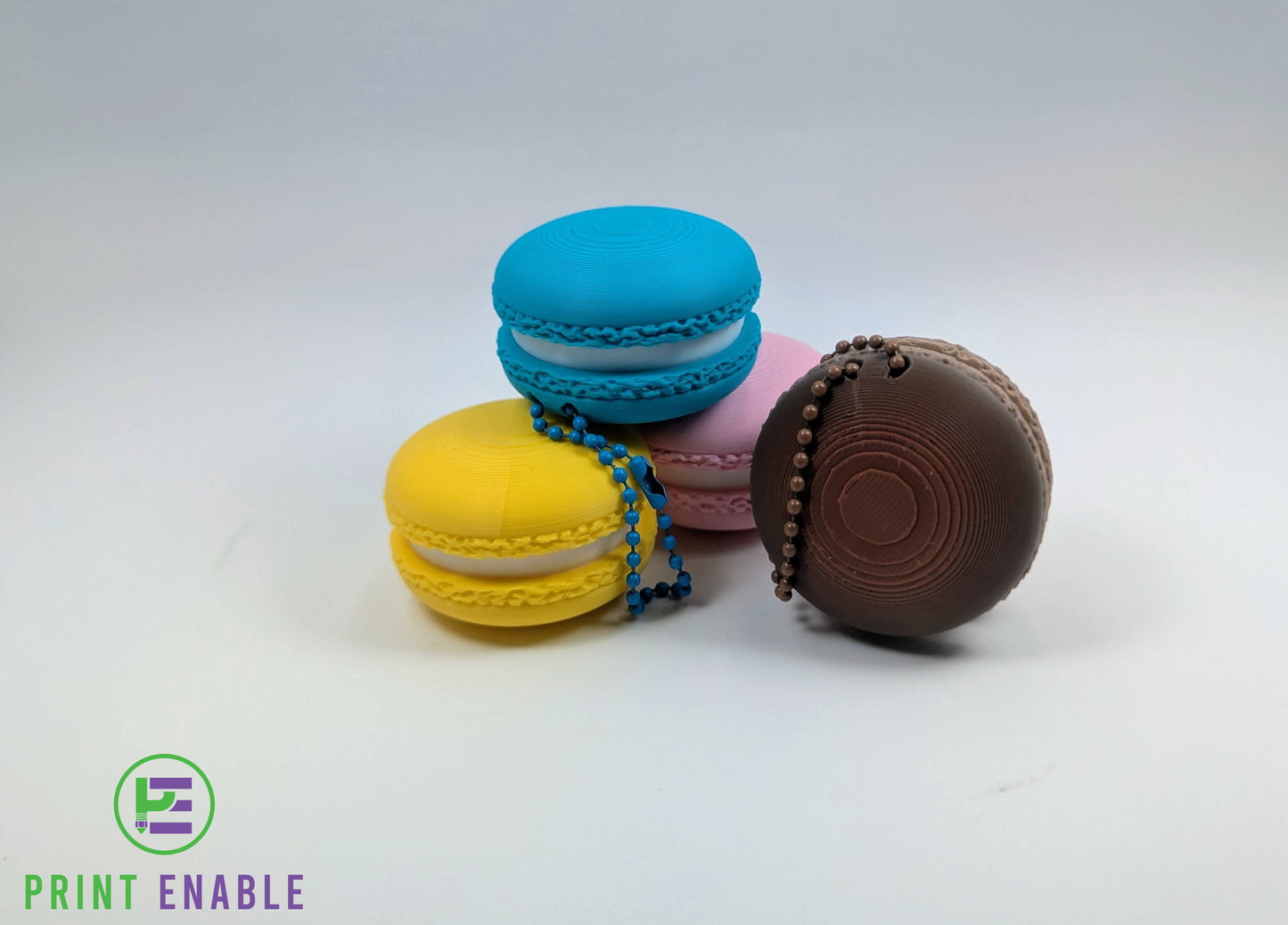 Assorted macaron clicker keychains in random colours