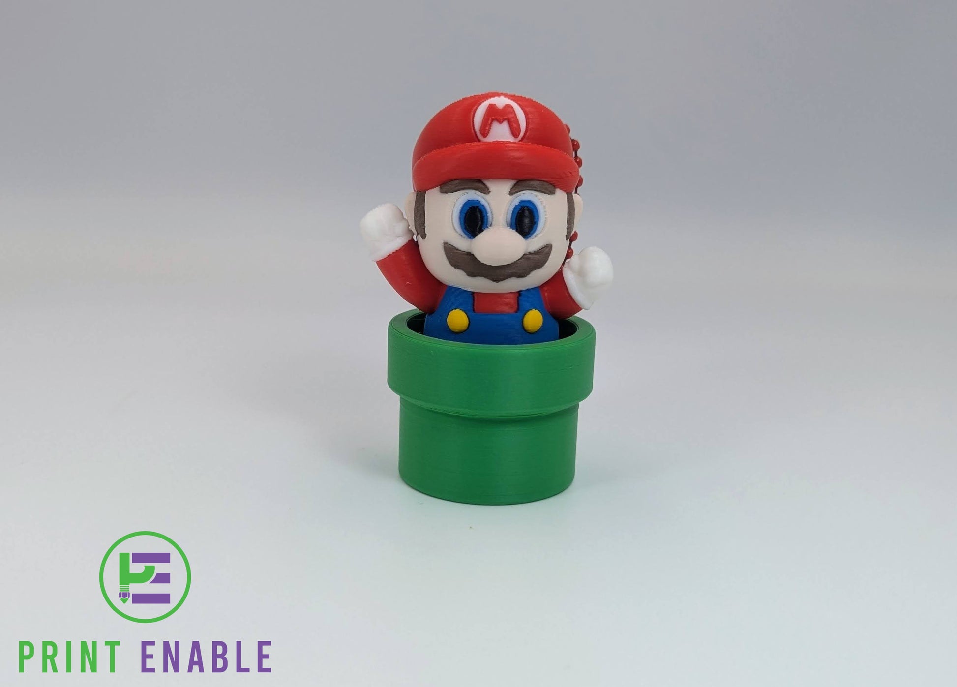 Mario Pipe 3D printed fidget clicker keychain featuring Mario emerging from a green pipe with a satisfying mechanical click action.