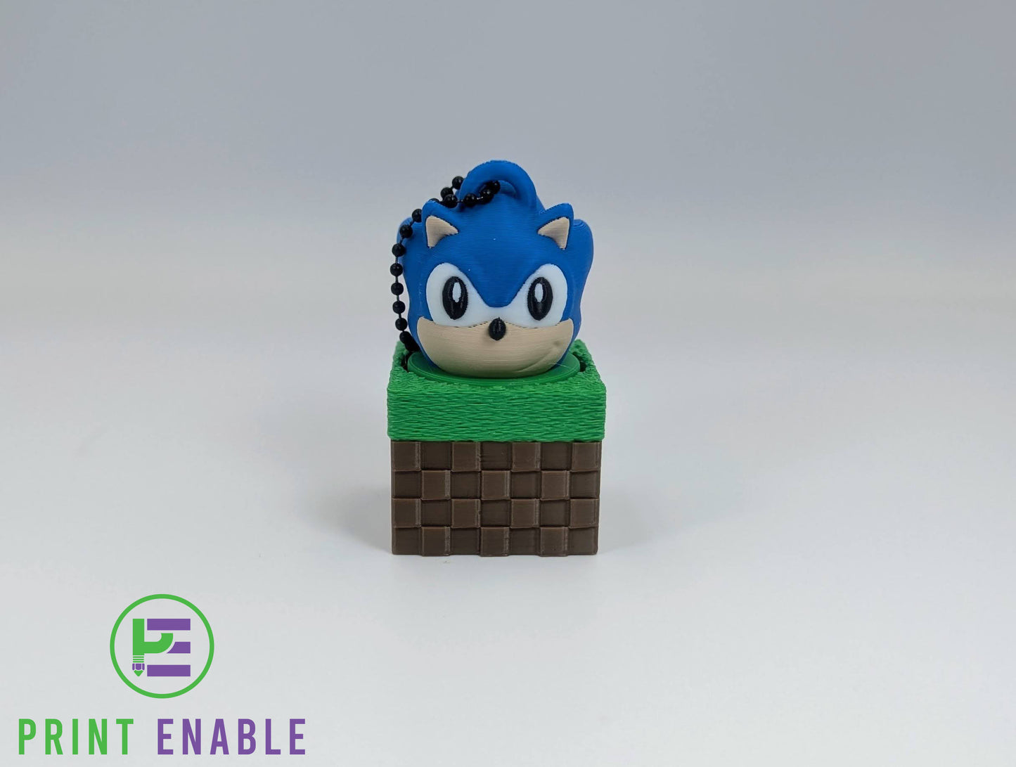Sonic Block 3D printed fidget clicker keychain featuring Sonic emerging from a pixel-style block with a satisfying mechanical click action.