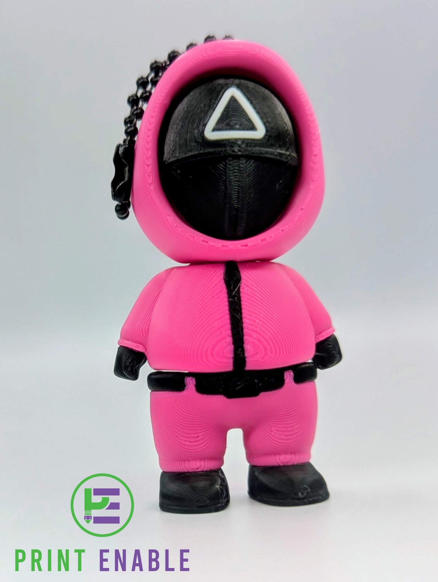 Squid Games-inspired triangle guard fidget clicker keychain